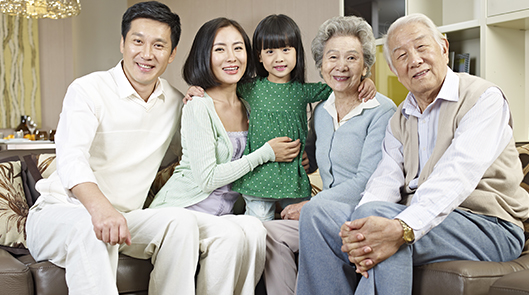 Home portrait of a three-generation asian family-about